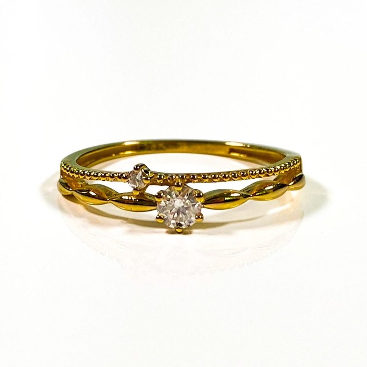 Élégance étincelante : Bague diamant en or jaune 18 carats